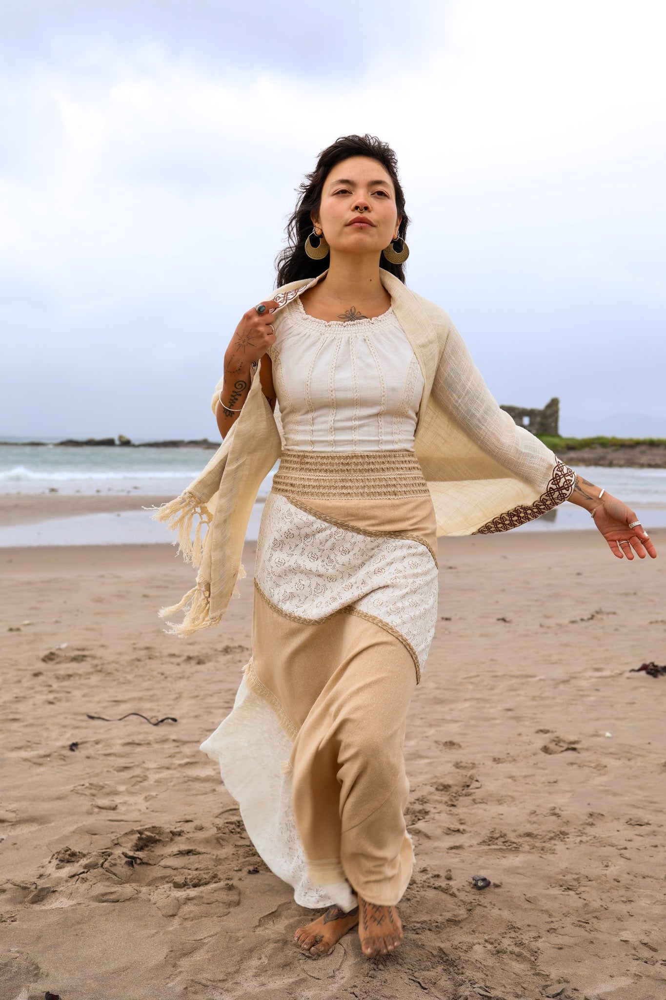 Natural boho skirt with earthy textures, patchwork style maxi skirt design in undyed cotton lace and jute styled in a coastal setting designed by Celtic Fusion