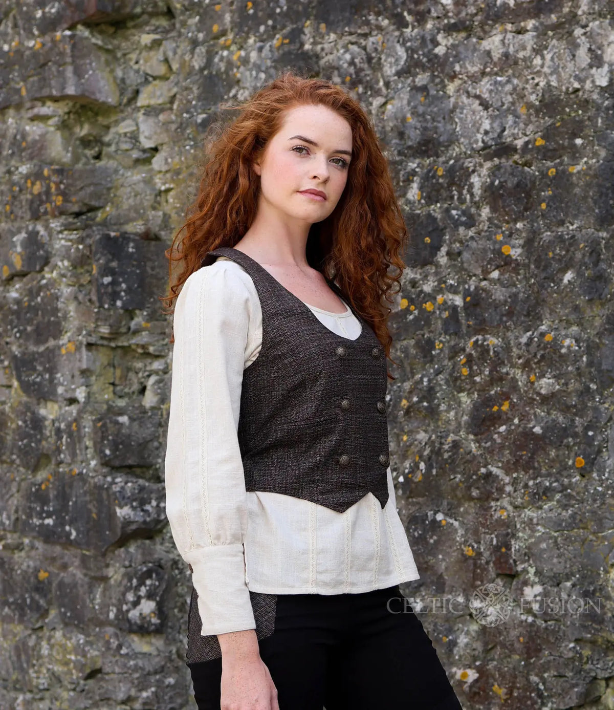 Womens Tweed Corset Waistcoat in textured woollen tweed with brass button detail and flattering fitted waistcoat shape