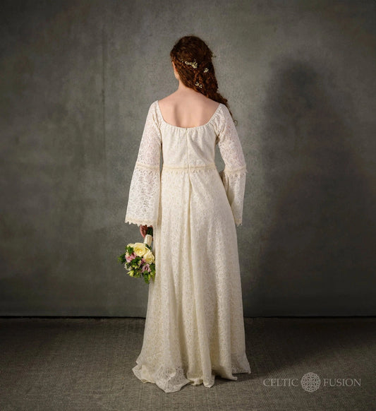 Bébhinn Boho Lace Wedding Dress back view, sustainable cotton lace gown with bell sleeves and flowing full-length skirt.