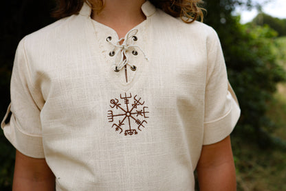 Close-up of Boys Vegvisir Celtic Shirt showing embroidered Vegvisir symbol, lace-up neck and natural cotton slub fabric