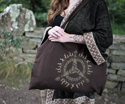 Brigid Celtic Tote Bag in earthy brown, featuring circular Celtic knotwork artwork and an early Irish verse associated with Brigid.