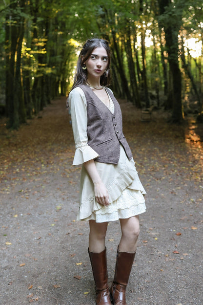 Brown women’s tweed vest layered over cream folklore clothing for rustic Celtic-inspired styling