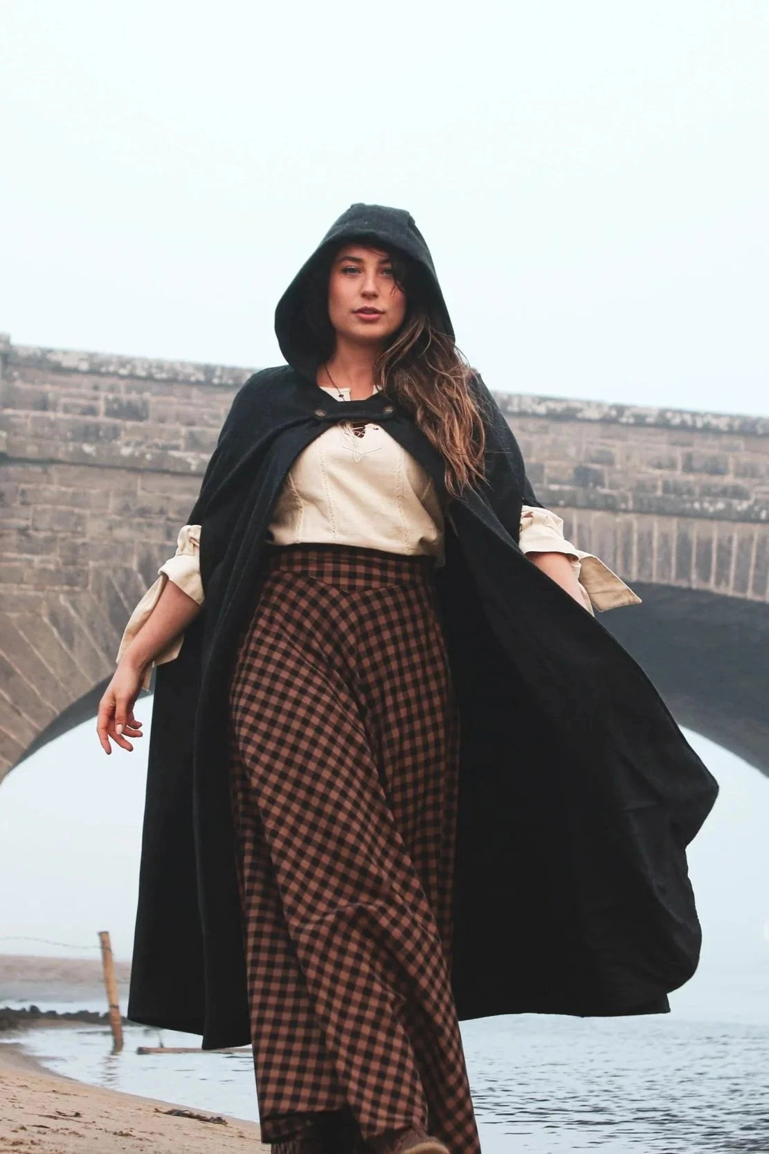 Black hooded wool cloak with long maxi length, sleeveless construction and dark folklore styling by Celtic Fusion