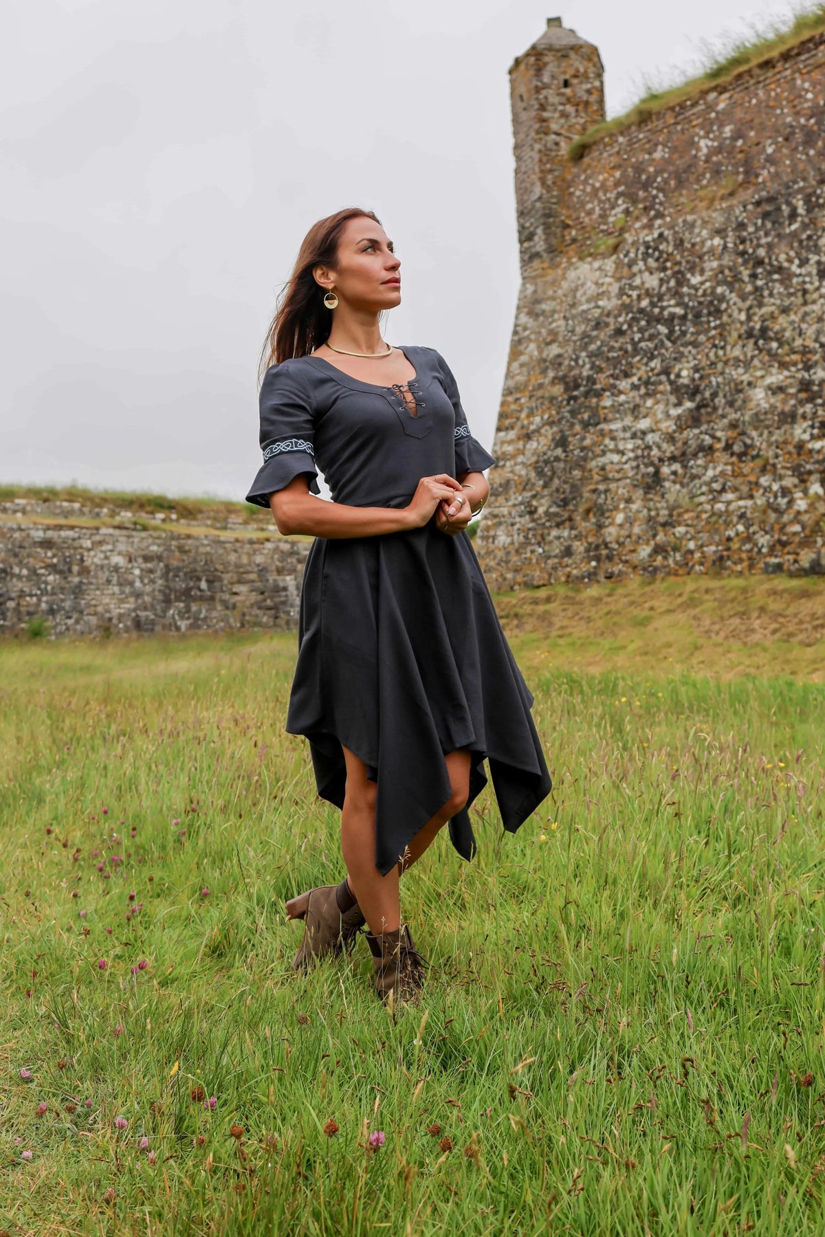 Celtic Fusion Design Blue corset dress with lace-up neckline, embroidered sleeves and asymmetrical handkerchief hem sustainably crafted in quality cotton slub