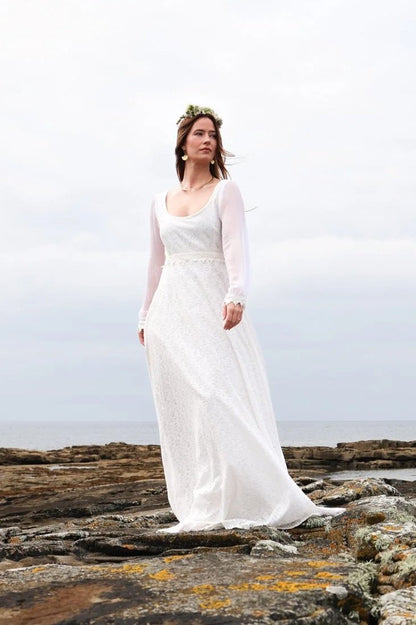 Celtic wedding dress in ivory cotton lace with bishop sleeves and soft flowing skirt for a handfasting ceremony