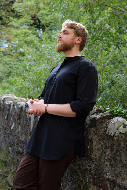 Dubh Celtic Embroidered Shirt in black 200gsm cotton with grandfather collar, button placket and modern knotwork cuff detail.
