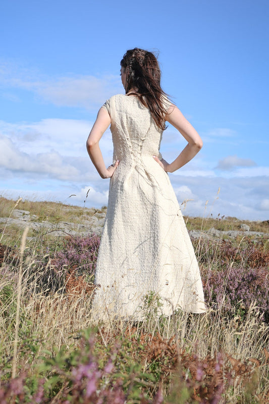 Ivory corset back vest showing adjustable lacing and the shaped waist designed by Celtic Fusion Clothing