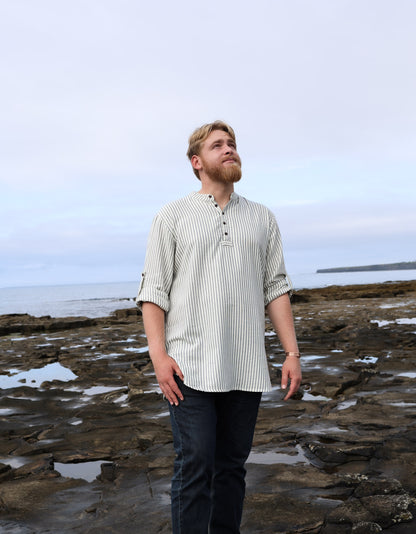 Men’s cream and blue cotton striped grandfather shirt with collarless neckline, long sleeves and relaxed fisherman-style fit.