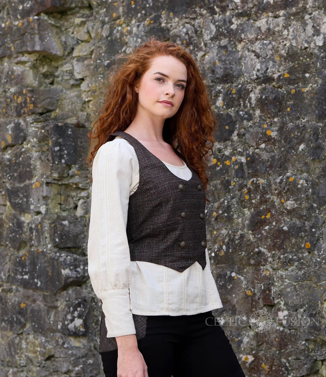 Womens Tweed Corset Waistcoat in textured woollen tweed with brass button detail and flattering fitted waistcoat shape