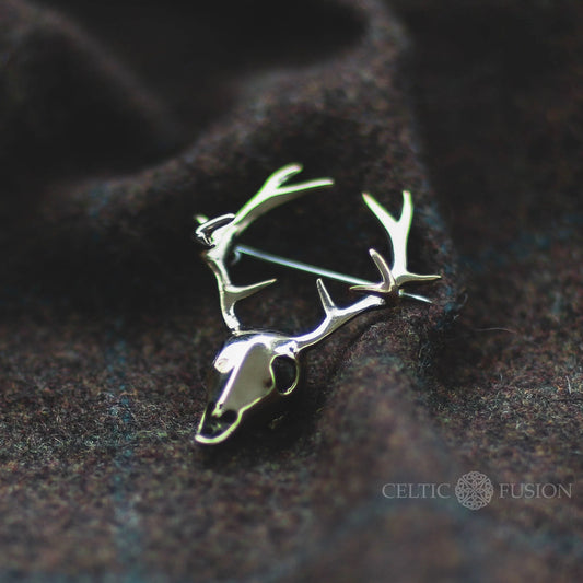 deer skull with antlers as brass pin brooch celtic jewellery design by Celtic Fusion