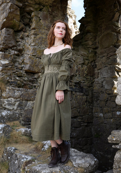 Sage green off shoulder embroidered dress with corset back, botanical waist detail and flowing cotton midi skirt designed by Celtic Fusion clothing.