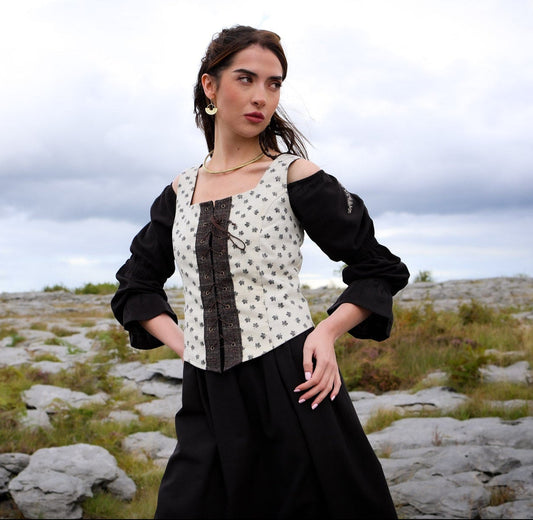 maple leaf layered folk corset over black dress in burren landscape