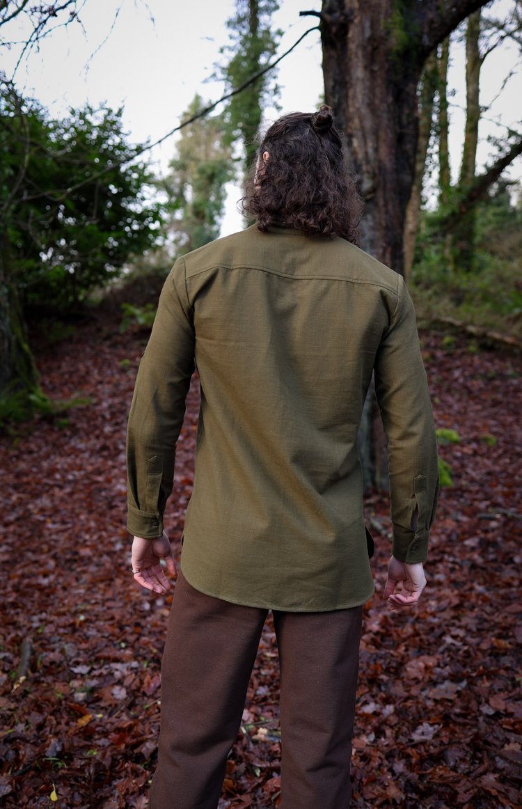 Back view of men’s forest green long sleeve shirt with clean tailored fit and collarless neckline